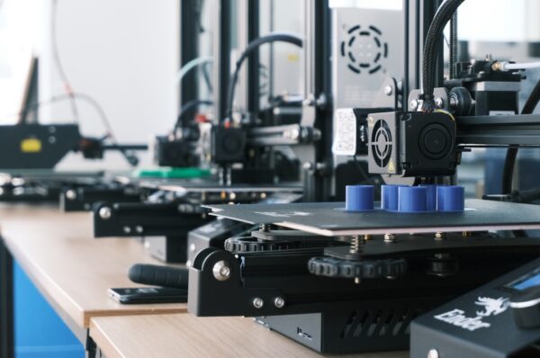 3D printers producing custom parts and prototypes