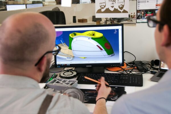 CAD engineering computer showing 3D model file workflow