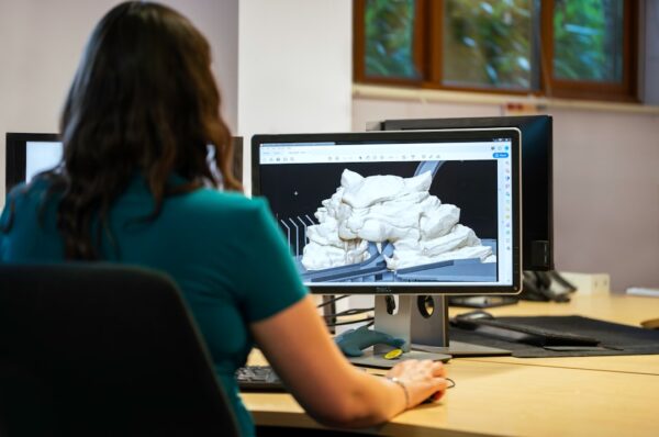 Engineer working with technical CAD measurements